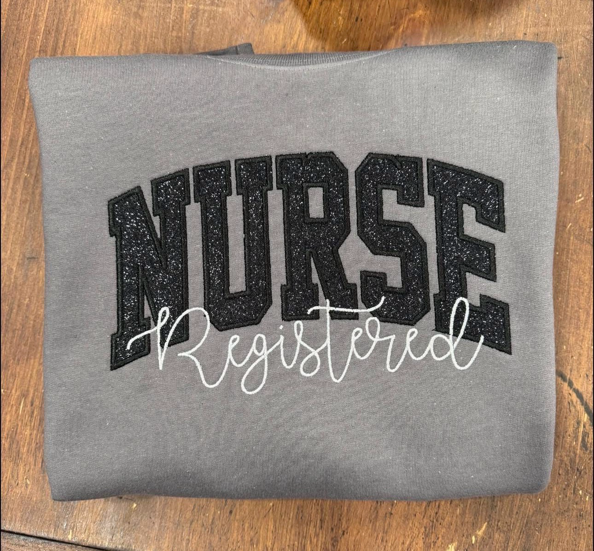 Black Registered Nurse- Embroidered Charcoal Gildan Sweatshirt